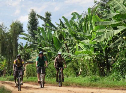 Cycling the slopes of Mount Kilimanjaro, we stay on an organic coffee farm and ride past villages and local markets.