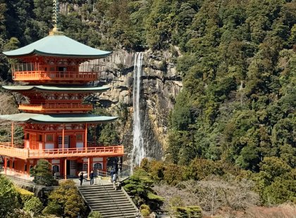Walk the well-worn stone steps to the grand shrine at Nachi Falls, the highest unbroken waterfall in Japan.