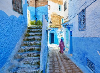 morocco chefchaouen blue alley woman walking