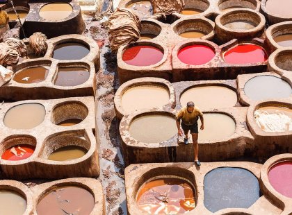 Close up view of local man at leather tanneries, Fes, Morocco