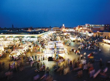 Djemaa El-Fna busy market at night, Marrakech, Morocco