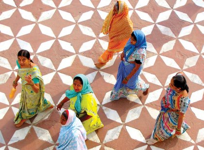 india agra locals colourful saris walking patterned ground