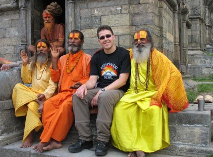 Traveller with a group of Sadhu's in Kathmandu, Nepal