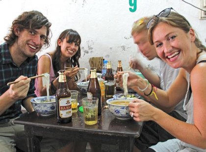 Try the local cuisine in Vietnam