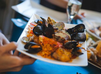 Try some of the delicious local seafood in Cinque Terre, Italy