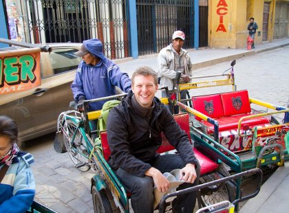 Catching a ride in a Peruvian taxi