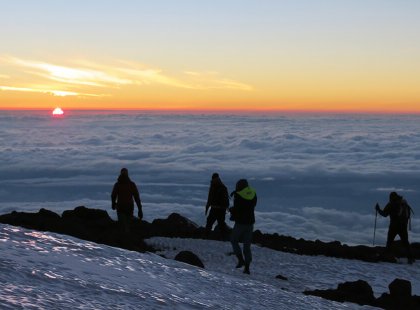 Attaining the summit at sunrise at the top of Africa is the ultimate reward.