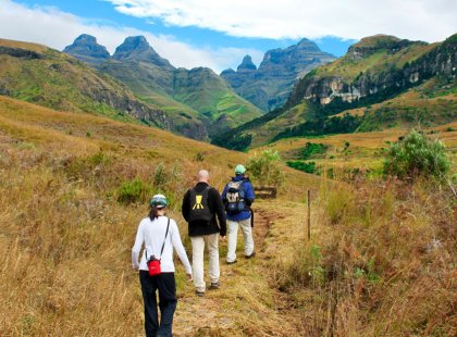 Hiking in the Cathedral Peak region of the Drakensberg Mountains.