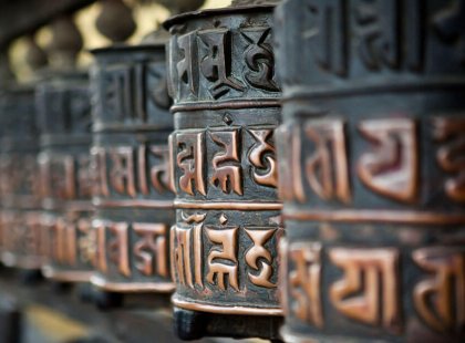 Buddhist prayer wheels bear the ancient mantra "Om Mani Padme Hum" and aid in expressions of devotion when spun clockwise by hand.