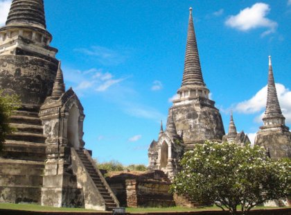 Ayutthaya, an ancient city founded in 1350, is famous for its spectacular temple ruins. We climb up the steep steps of the main temple for amazing views.