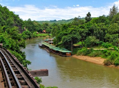 We'll take a short historical train ride through Kwai Noi gorge, made infamous by events of World War II. Later we'll paddle the waterway via canoe.