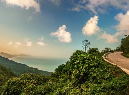 Pedal up Hon Gio Pass and enjoy a long descent with breathtaking vistas.