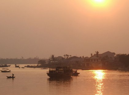 A beautiful sunset from a bridge in the quaint village of Hoi An.