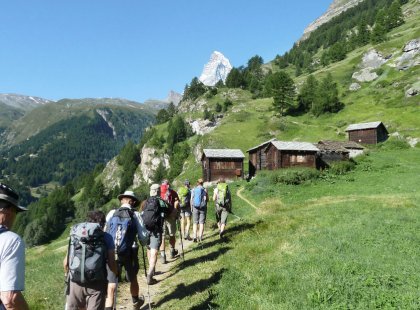 As we walk, we are treated to one view after another of soaring mountains, pleasant green meadows and sneak peeks of the Matterhorn.
