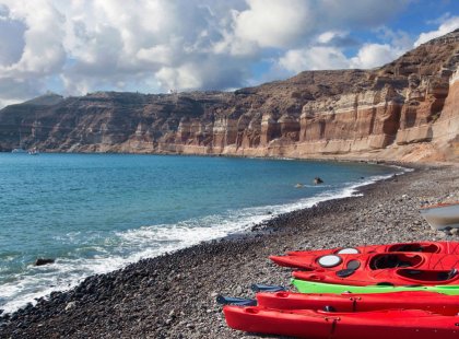 Board our sea kayaks to explore the world famous Red and White beaches of Santorini framed by towering cliffs.