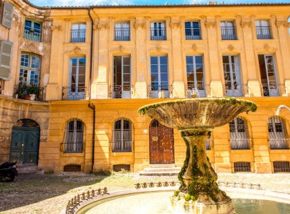 Stroll the tree-lined streets of Aix-en-Provence, dotted with quaint courtyards and fountains, outdoor cafes and markets.