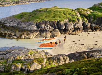 We go sea kayaking in a sheltered sea loch, home to a large seal colony.