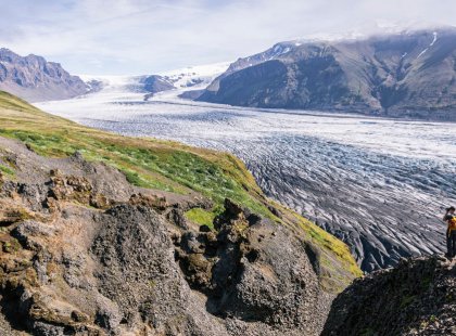 The diverse landscape of Vatnajökull National Park features massive glaciers, jagged peaks, serene birch forests and wildflower-laden meadows.