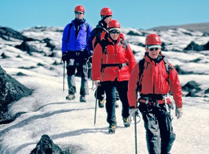 After strapping on crampons and grabbing our ice axes, we take an exhilarating walk on Solheimajokull glacier.