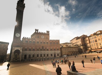 Hop off our bikes and spend time wandering the medieval backstreets or relax in the famous square of Siena, Piazza del Campo.
