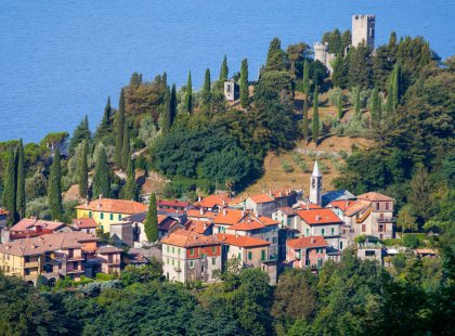 Hike through olive terraced fields, past medieval castles, quaint villages, and along lakeside trails offering panoramic views of Lake Como.