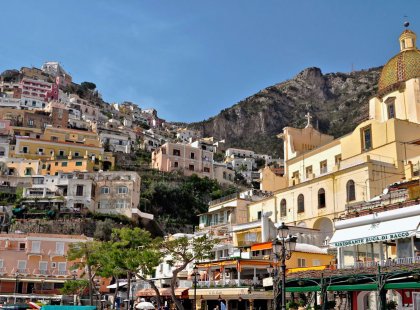 Our hike on Day 4 leads us to Positano, a lovely village of colorful Moorish-style houses built above a sand beach that melts into the bay.