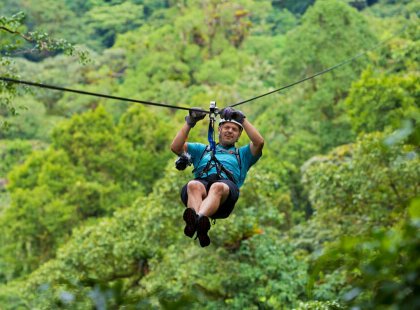 Zipping high above the trees is a rush and offers a bird's-eye view into the rainforest canopy.