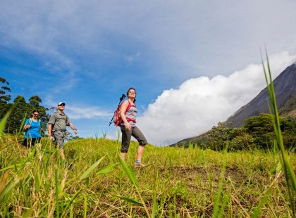 Trails through Arenal Volcano National Park weave through fields and forests, over old lava flows, and offer great views on a clear day.
