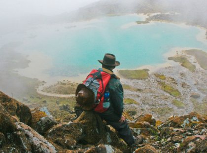 A glacial lake greets a trekker in the Soraypampa valley.