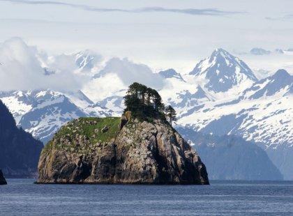 With miles of rugged coastline containing massive tidewater glaciers, snowcapped mountains and an abundance of marine wildlife, Kenai Fjords National Park is one of Alaska’s crown jewels.