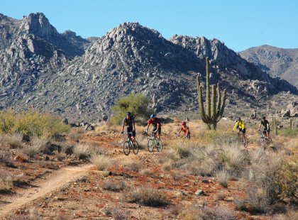 Activity-filled days in the saddle combine rolling singletrack with amazing views of gorgeous, surprisingly diverse desert landscapes, surrounded by rugged mountain ranges.