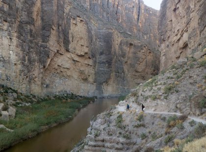 The 1,500-foot cliffs of Santa Elena Canyon stand high above the waters of the Rio Grande.