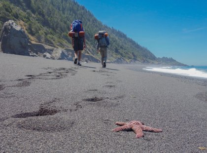 The challenging and varied terrain of this adventure includes stretches along pebbled beaches.