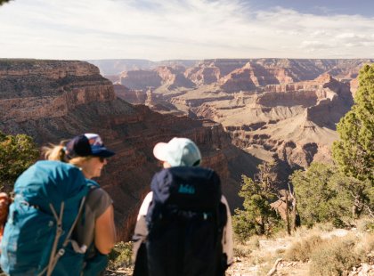 New friends celebrate an amazing journey backpacking the Grand Canyon.