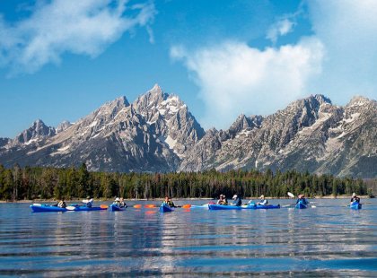 Viewing the Tetons of the Cathedral Mountain Range from the vantage point of a kayak on flat water is an experience not to be missed.