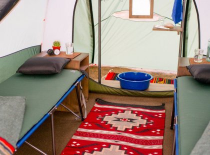 Our tent sites are ideal for relaxing and having fun, with custom furniture and cozy décor.