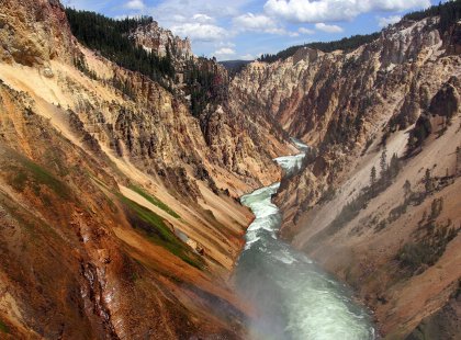 Explore the dramatic Grand Canyon of the Yellowstone, hiking along the colorful canyon rim for views of the Yellowstone River far below.
