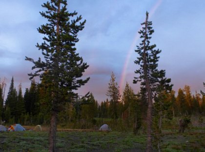 Relax with new friends each night in cozy riverside campsites under the wide open Rocky Mountain sky.