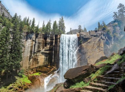 From Glacier Point, hike the spectacular Mist Trail past Vernal and Nevada Falls down to the valley floor.