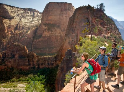 Before the final push to the top of Angel's Landing, we're awed by stunning views of the valley floor and surrounding peaks from high atop Scout's Lookout.