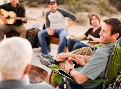 Relax and share stories around the evening campfire with new friends.