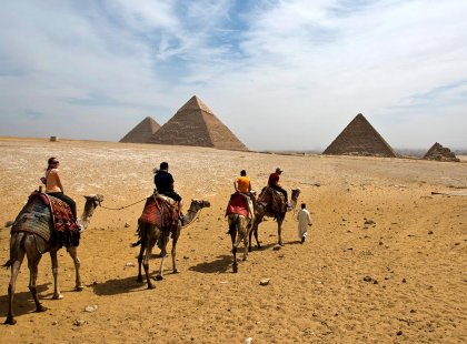 Take a camel trek past the Pyramids in Egypt