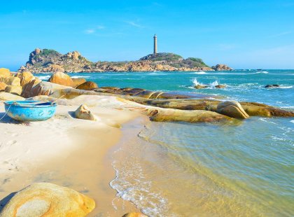 Coastal view of the famous Ka Ga lighthouse and beach, Vietnam along an Intrepid Travel tour