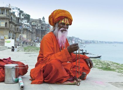 Guru sitting on the banks of The Ganges, Varanasi, India