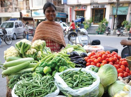 Street vendor selling vegetables in Delhi, India