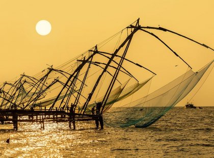 india kerala kochi fishnets yellow sunset