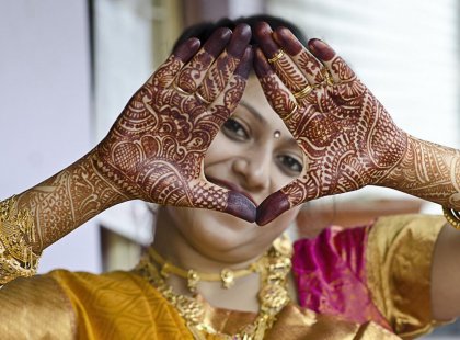 Bengali Woman with beautiful mehendi design on hand