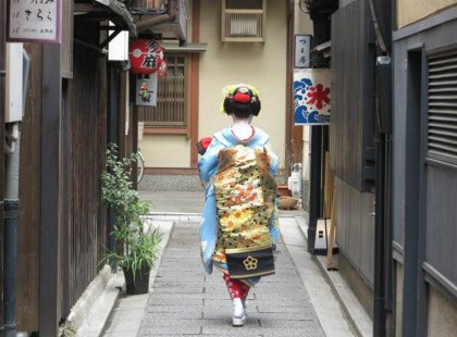A geisha in a street in Kyoto