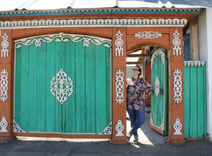 Intrepid Travel mongolia ulaanbaatar woman in green doorway