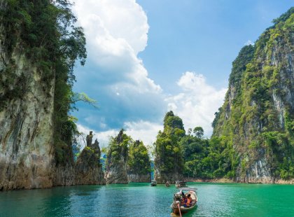 Boat ride between the limestone cliffs, Khao Lak, Thailand